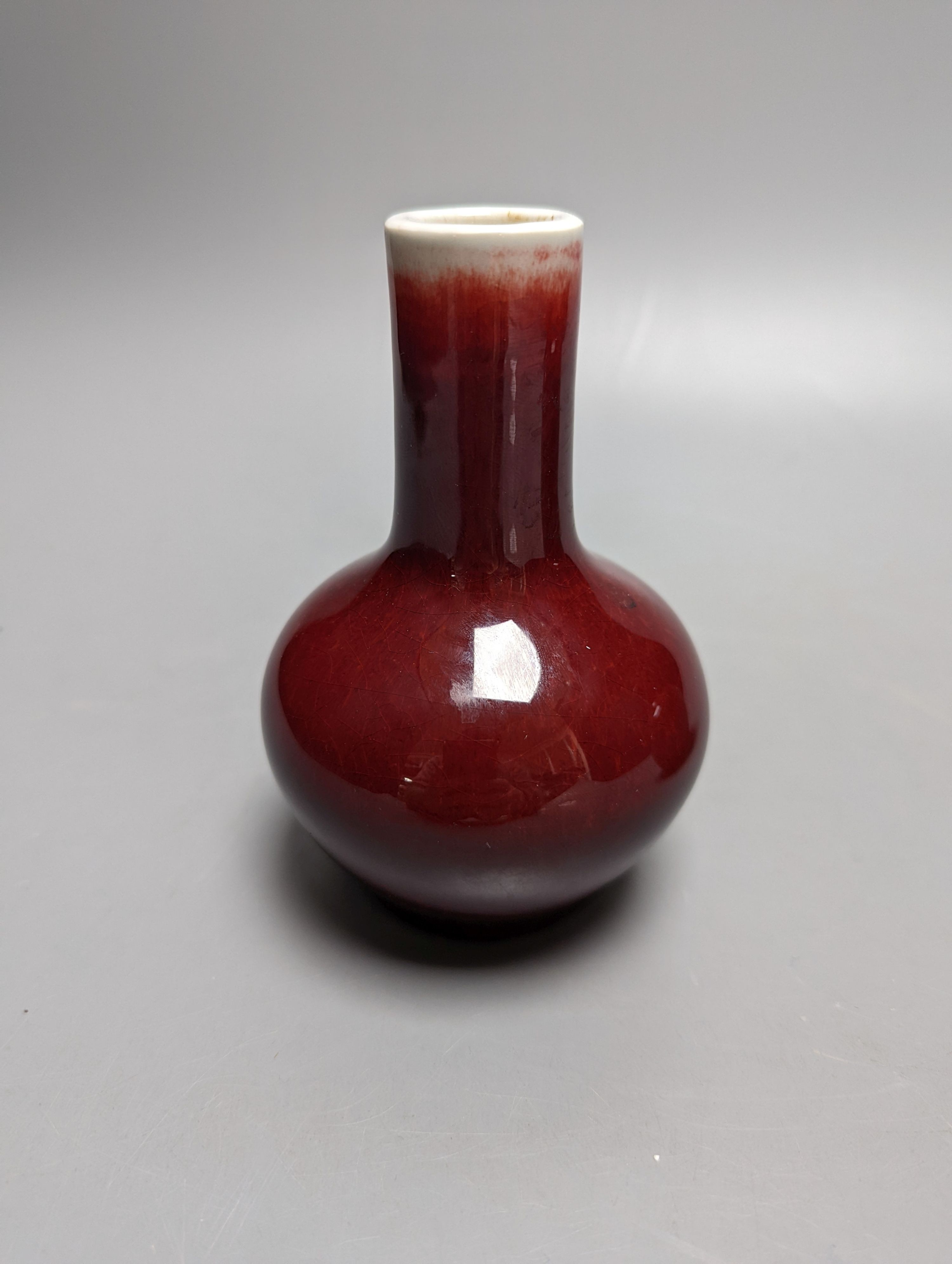 Two Chinese sang-de-boeuf bottle vases 14cm